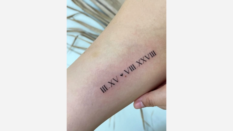 1. Date Roman Numeral Tattoos