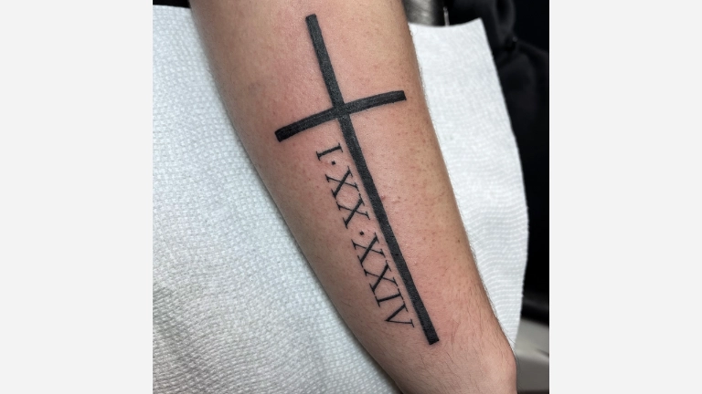 Roman Numeral Cross Tattoo
