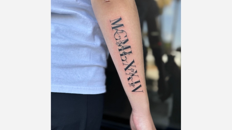 Roman Numeral Name Tattoo