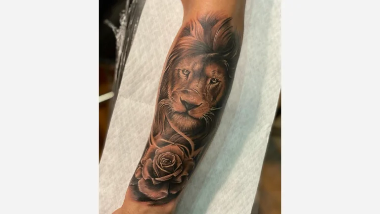 Lion and Flowers Tattoo