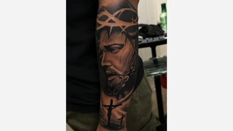 Forearm Religious Tattoo