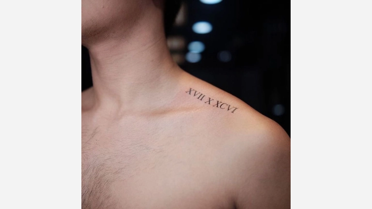 Roman Numeral Shoulder Tattoo
