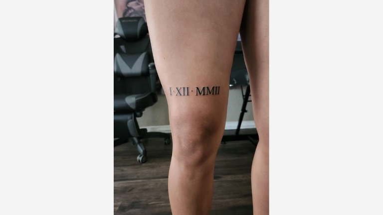 Roman Number Leg Tattoo