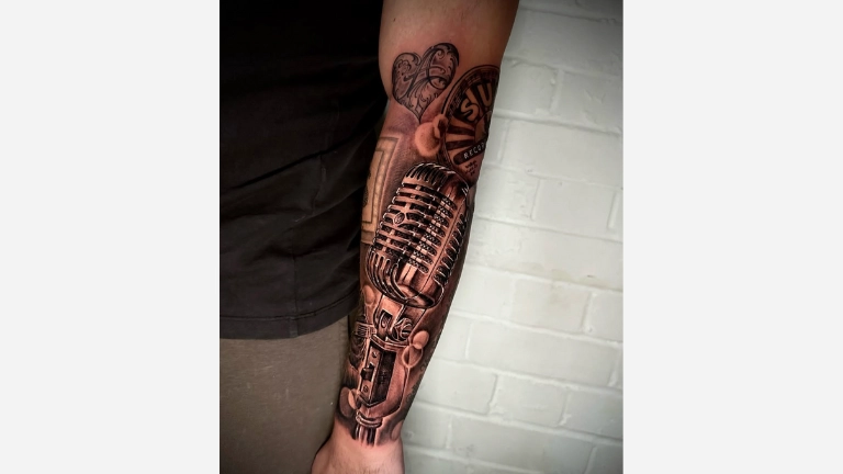 Forearm Music tattoo