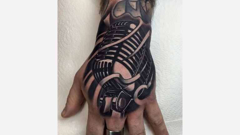 Hand Music Tattoo