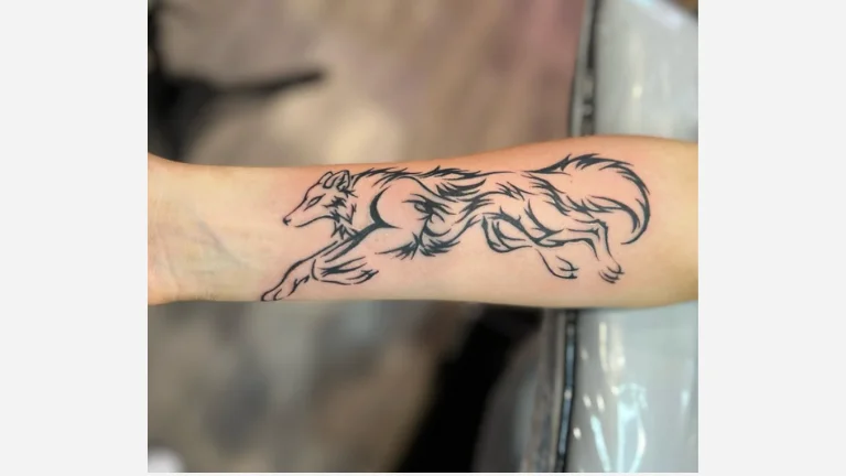 Wolf Running Tattoo