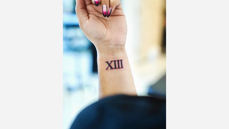 Roman Numeral 13 Tattoo