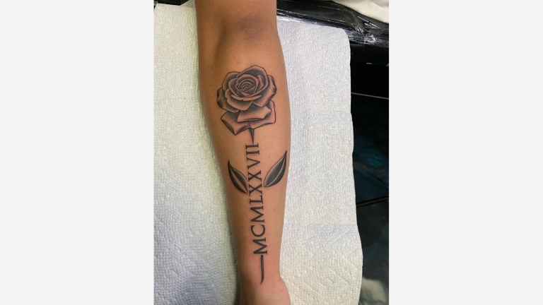 Roman Numeral Rose Tattoo