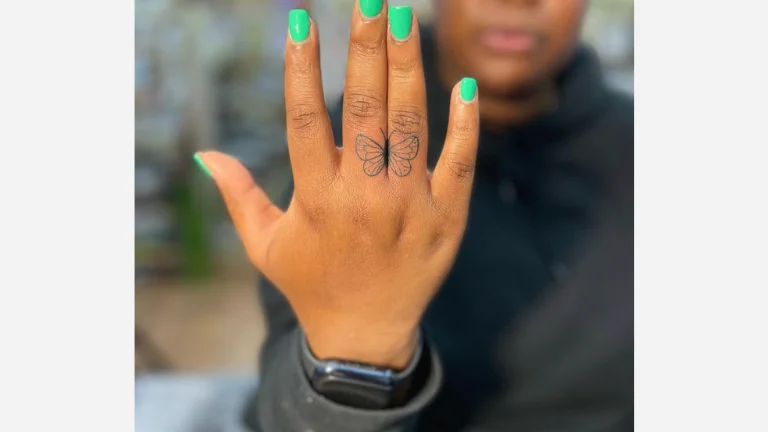 Butterfly Fingers Tattoo