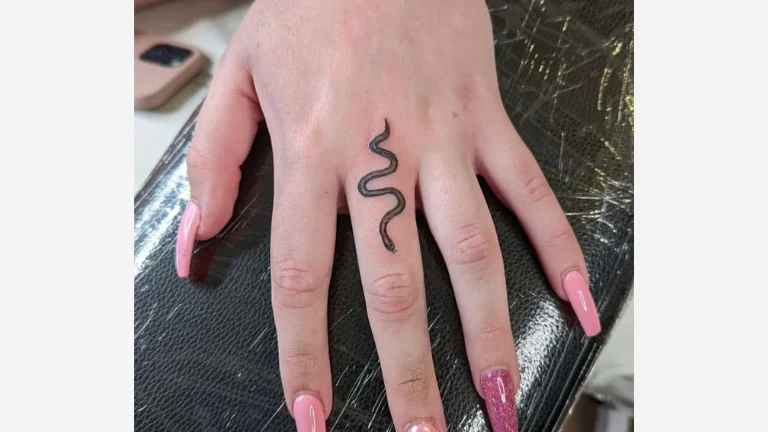 Snake Finger Tattoo