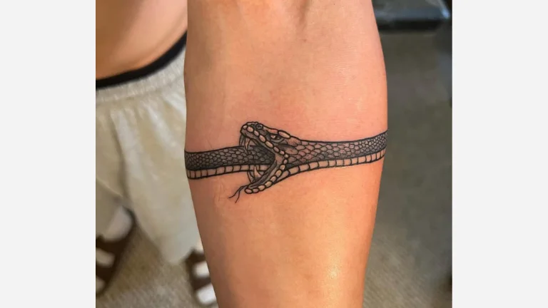 Snake Eating Itself Tattoo